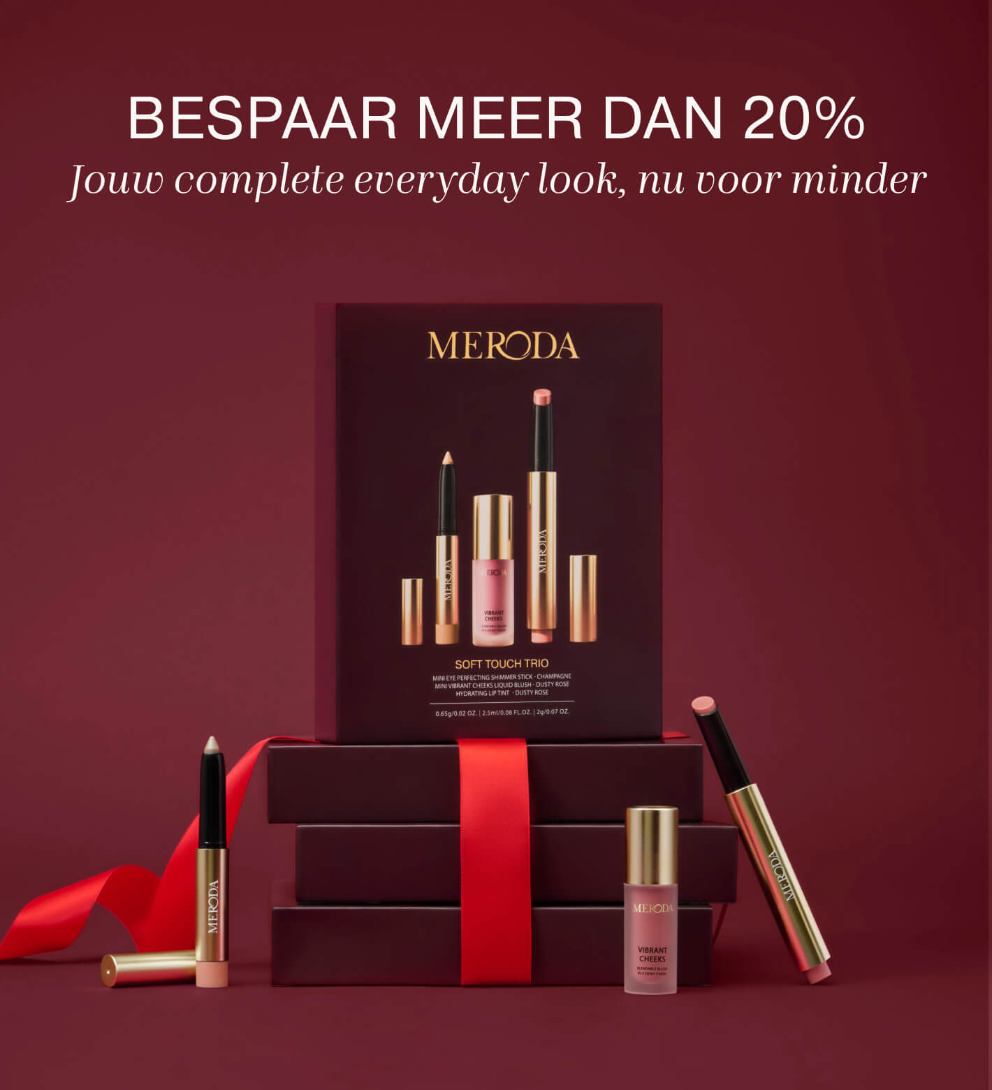 Soft Touch Trio make-up set in geschenkdoos met shimmer stick, liquid blush en lip tint omgeven door een rood lint