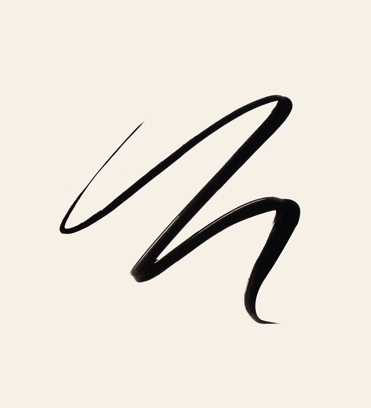 Zwarte swatch van Liquid Waterproof Eyeliner - It's All About The Wing op een lichte achtergrond
